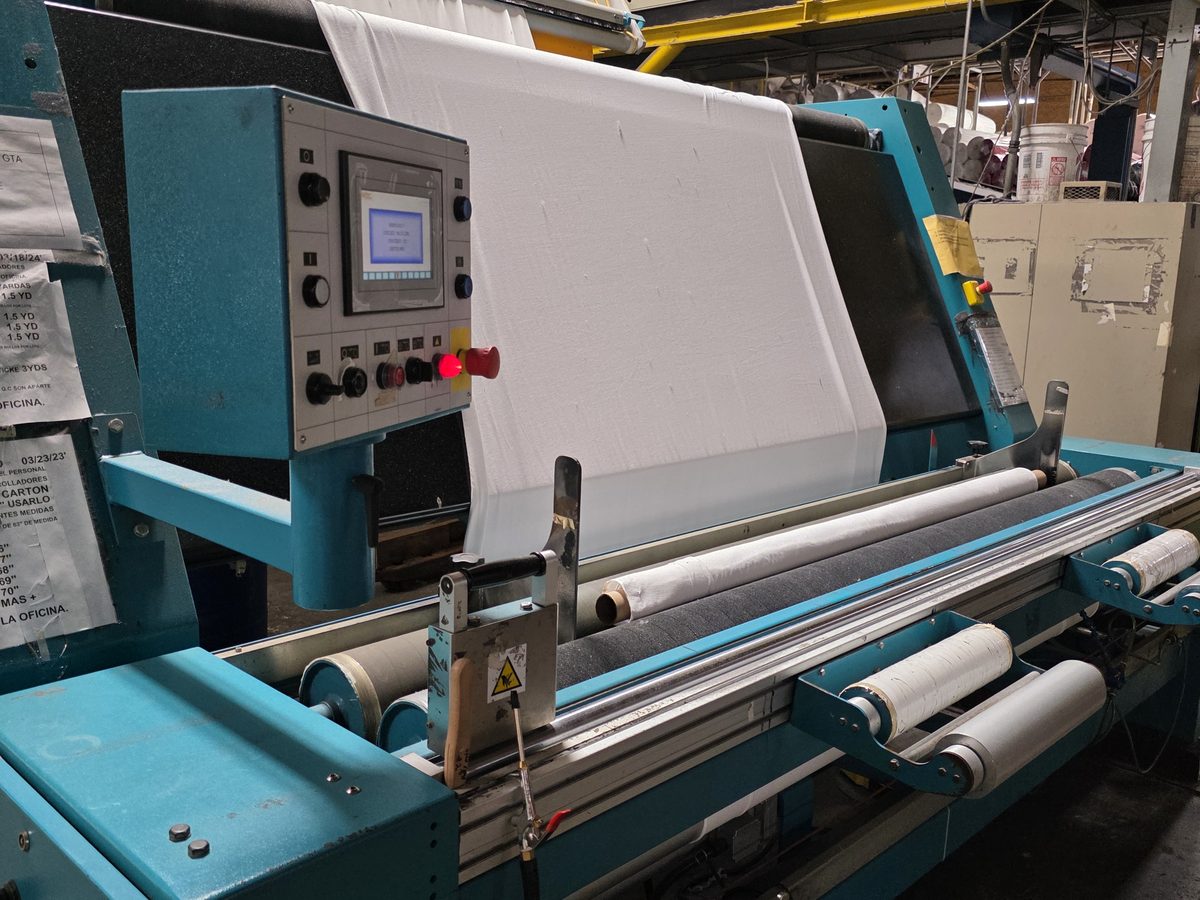 Fabric compacting machine