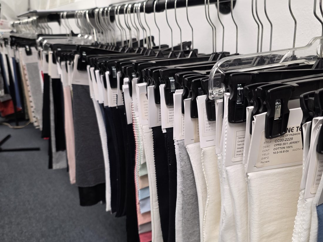 Hanging fabric swatches for inspection