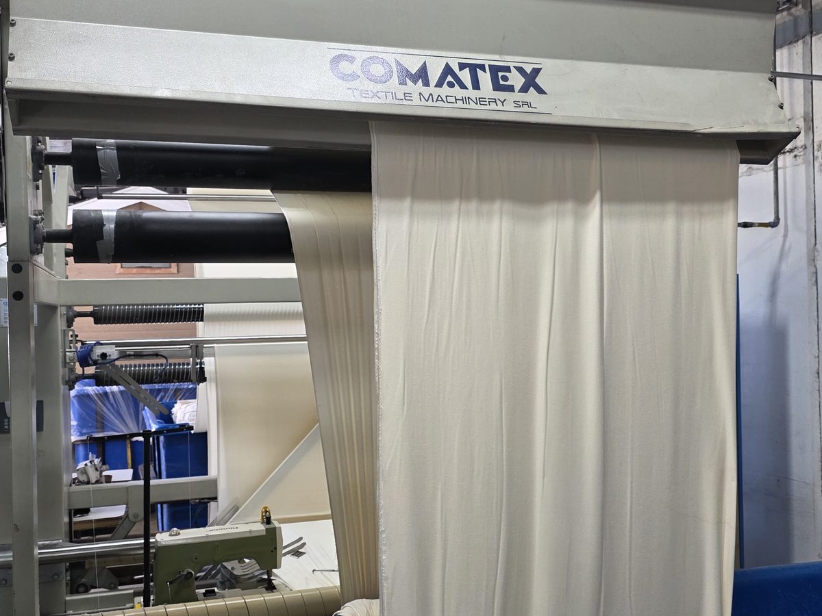 Cutting-edge fabric finishing machine running fabric